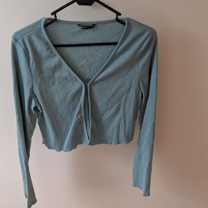 Shein cropped light blue casual Long sleeve shirt. No size tag.